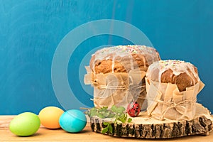 Orthodox baking for the Easter Spring Festival. Traditional cakes and painted eggs. Baking sprinkled with icing,