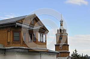 Orthodox Christian Cathedral with golden domes and crosses against the sky, spring day. Tserkov` Smch.kharlampiya, Tsivilsk,