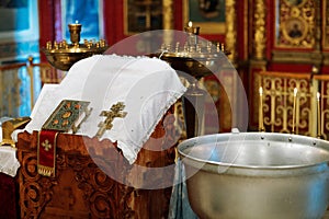 Orthodox Christian Cross, Holy Bible and utensils in the church. Epiphany ceremony rite.