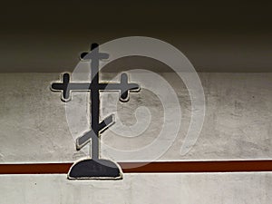 Orthodox christian cross on a wall