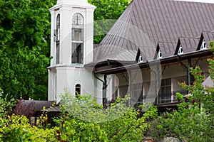 Orthodox church against the background of forest and sky in a monastery in the north of Moldova