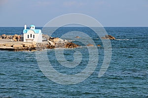 orthodox church (agios dionysios d\'olymbos) and mediterranean sea in galatas in crete