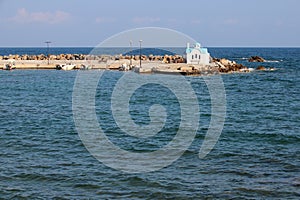 orthodox church (agios dionysios d\'olymbos) and mediterranean sea in galatas in crete