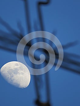 Orthodox church cross and the moon. The city of Naples from above. Napoli. Italy. Vesuvius volcano behind.