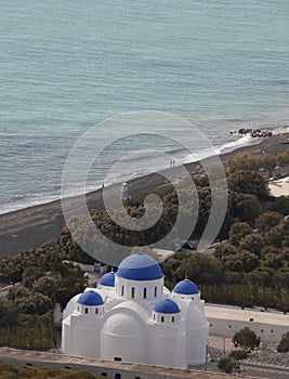 Orthodox Church of Holy Cross in the city of Perissa, Santorini island Greece.