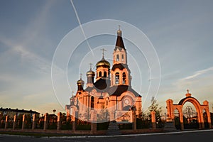 Orthodox church in honor of St. Nicholay in the city of Tarko-Sale in the Yamalo-Nenets Autonomous Okrug in Russia against a