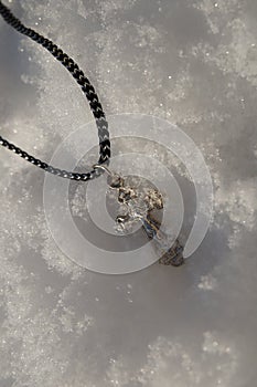 Orthodox cross in the snow