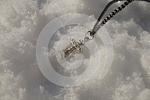 Orthodox cross in the snow