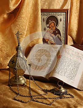 Orthodox icon, books and censer photo