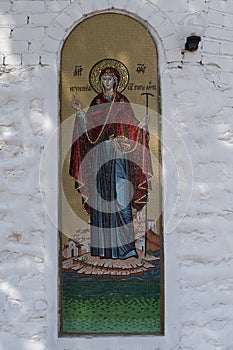 The Orthodox icon is a fresco on the wall of a Russian Orthodox Church.