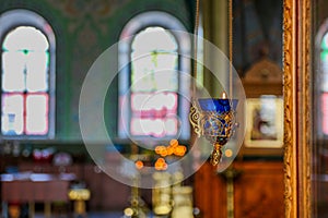 Orthodox icon lamp hanging on the background of the interior. of the Orthodox church. Lampstand church