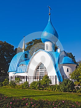 Orthodox white church with blue domes