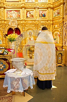 Orthodoxal priest in church