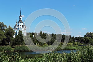 Orthodoxy Christian Church and footbridge on the riverside