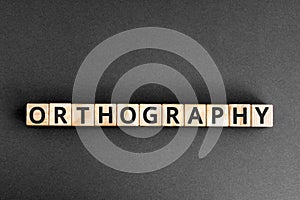 orthography - word from wooden blocks with letters photo