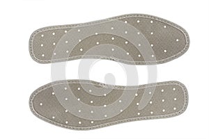 Orthopedic antibacterial insoles isolated on white background