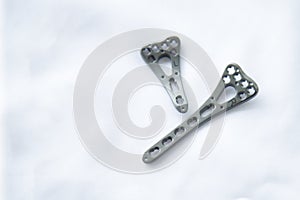 Orthopedic Implant Distal Radius locking plate on a white table.