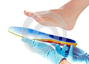 Orthopedic insole in the hands