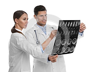 Orthopedists working with X-ray picture on background