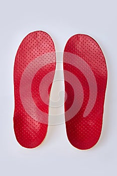 Orthotics on a white background. Insert in shoes to support the foot.