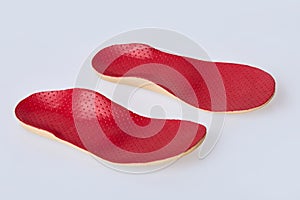 Orthotics on a white background. Insert in shoes to support the foot.