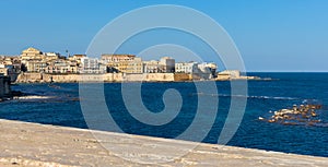 Ortigia island of Syracuse old town along Lungomare d\'Ortigia with Forte Vigliena fortress at Ionian sea in Sicily in Italy photo