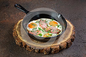 ortioned baked eggs in ceramic cocotte with Different delicious egg recipes