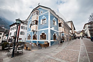 Ortisei, city center. Housing colored construction. Europe, Italy