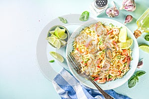 Orzo pasta with seafoods photo