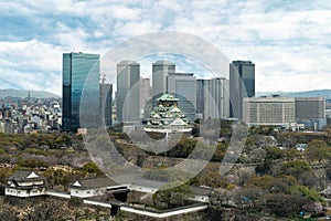 Osaka Castle with Osaka business park financial district in Osaka city, Japan