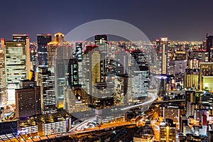 Osaka downtown skyline from Umeda sky building at night photo