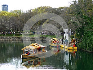 Osaka, Japan. 2 April 2016 - Tourist on the pier of a Golden Wasen (Osaka Castle Gozabune)