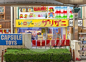 Retro Game Center Zarigani featuring capsule toys machines and iconic arcade games in Osaka.