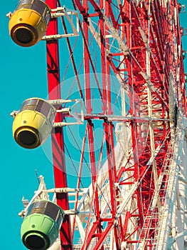 OSAKA, JAPAN - March 28, 2018 Redhorse Osaka Wheel, EXPOCITY, and amusement park Osaka Monorail viewed from Expo `70 Commemoration