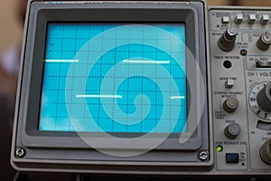 Oscilloscope signals a square wave on the display. instrument for measuring electrical signals in a circuit. tool for managing
