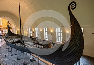 Oseberg ship excavated from ship burial archeological site, exhibited in Viking Ship Museum on Bygdoy peninsula of Oslo, Norway