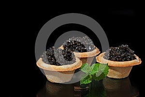 Osetra caviar in tartlets photo