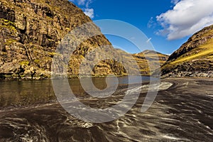 Osin Bay connecting the village of Saksun with the Atlantic Ocean. Saksun, Faroe Islands