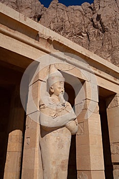 Osiride statue of Pharaoh Hatshepsut at the upper terrace Mortuary temple of Hatshepsut at Deir el-Bahari near Luxor, Egypt