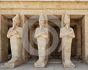 Osiride statues of Hatshepsut on the upper terrace of the Mortuary Temple of Hatshepsut near Luxor, Egypt.