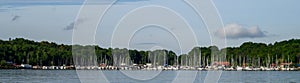 Oslo fjord, marina full of sailboats across the fjord on a sunny day, as a nature background