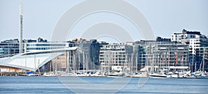 Oslo harbor or harbour at the Aker Brygge neighbourhood in Oslo. Oslo is the capital of Norway