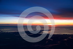 OSLO, NORWAY - JAN 21st, 2017: View off the sunrise, norway during winter from inside the plane during my Lufthansa