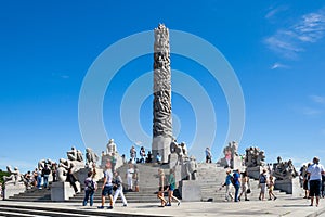 Visitors enjoying the statues in the popular Vigeland Park in Oslo