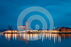 Oslo, Norway. Night View Embankment And Sea Port Terminal In City Center In Oslo, Norway. Summer Evening. Lights photo