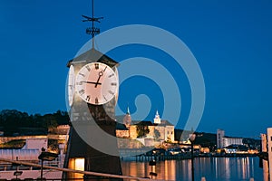 Oslo. Norway. Old Clock at Aker Brygge In Oslo Embankment, Norway. Night View Of Famous And Popular Place