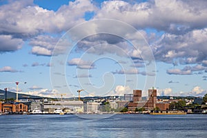 Oslo, Norway - Panoramic view of Oslo waterfront with City Hall, Aker Brygge and Tjuvholmen borough at Pipervika harbor