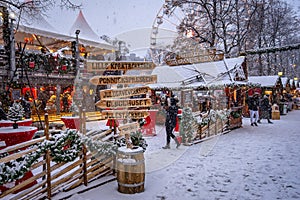 Oslo, Norway - Traditional Christmas market with falling snow