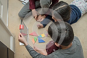 Leicester, Leicestershire, United Kingdom. 22 February 2019. School age kids learning and enjoying on Osmo, a platform using iPads