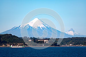 Osorno and Puntiagudo volcanoes from Puerto Montt photo